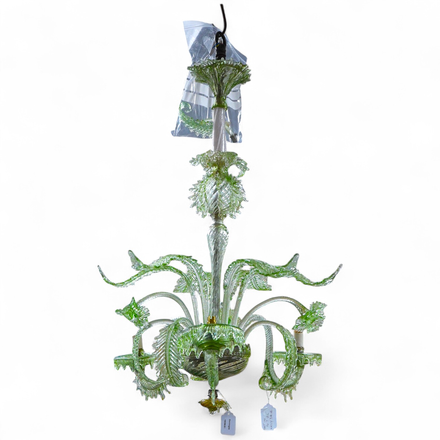 An ornate leaf and floral green glass Murano three branch chandelier, 84cm high.